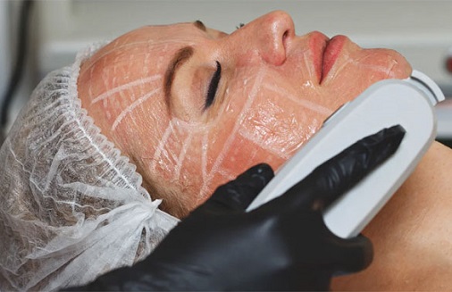 Anti-aging treatment facial with mask and massage.